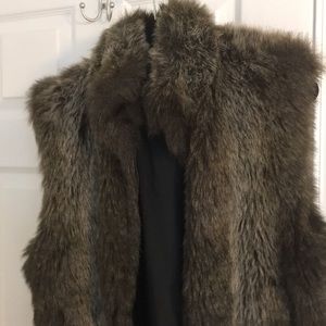Fur vest vey cute and warm.